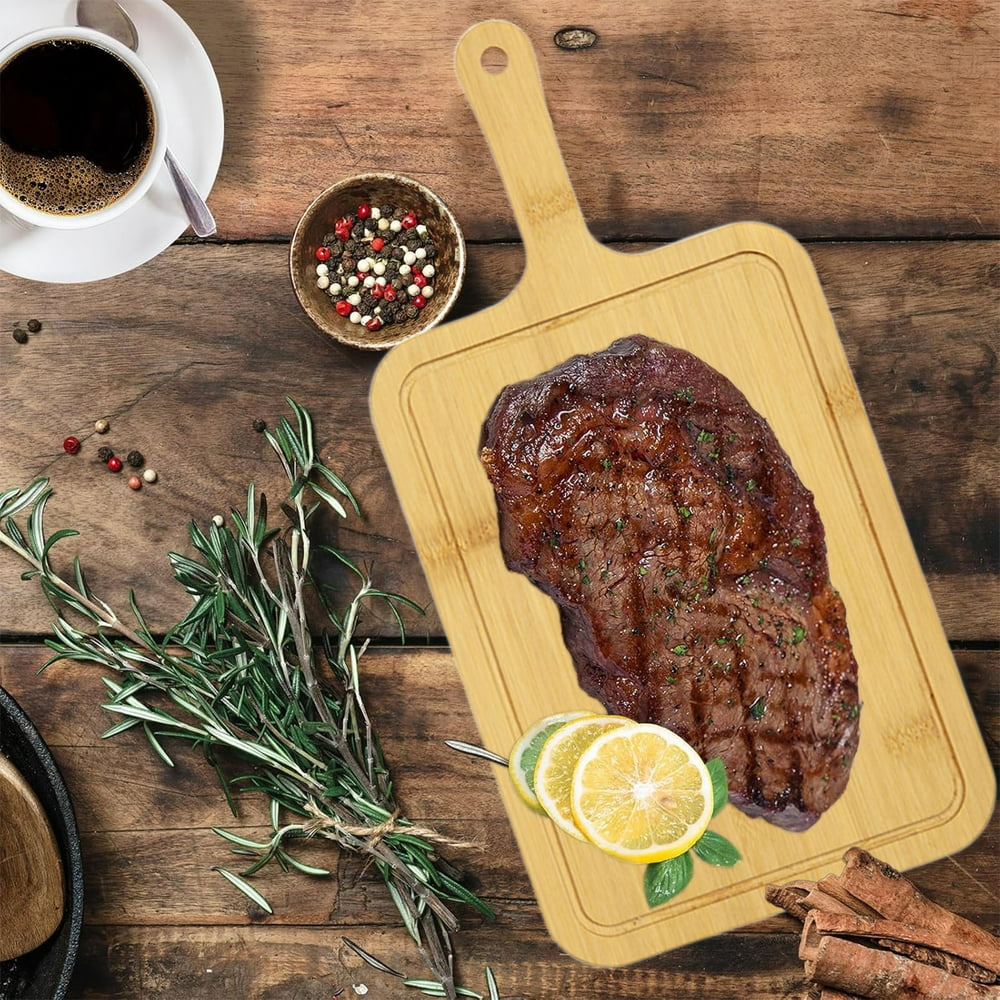 Bamboo Cutting Board with Handle, Portable Paddle Serving Board with Juice Groove for Outdoor Picnics  product photo